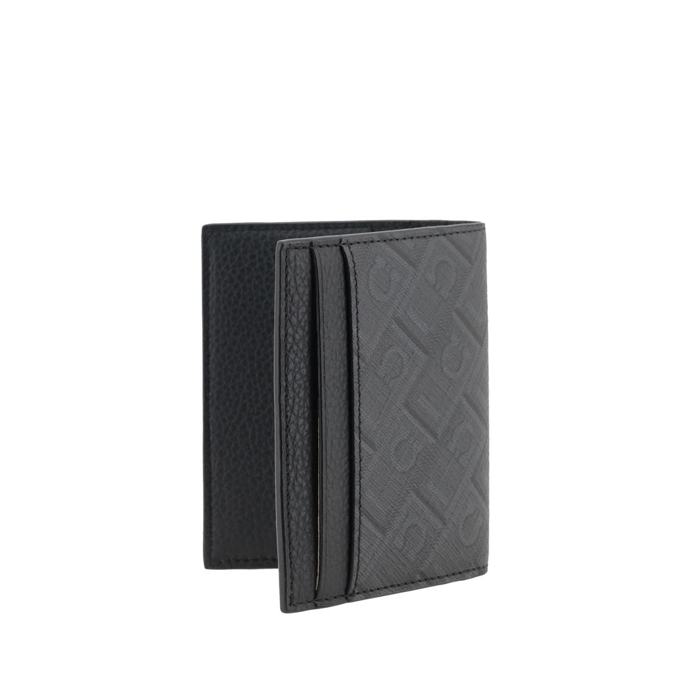 Ferragamo Black Calf Leather Bos Taurus Wallet Curated Luxury Accessories by Orvyn