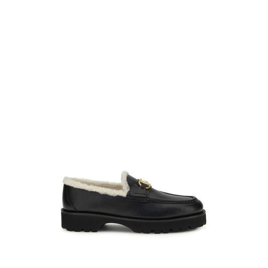 Valentino Garavani Black Calf Leather Bos Taurus Slip-On Loafers Curated Luxury Accessories by Orvyn