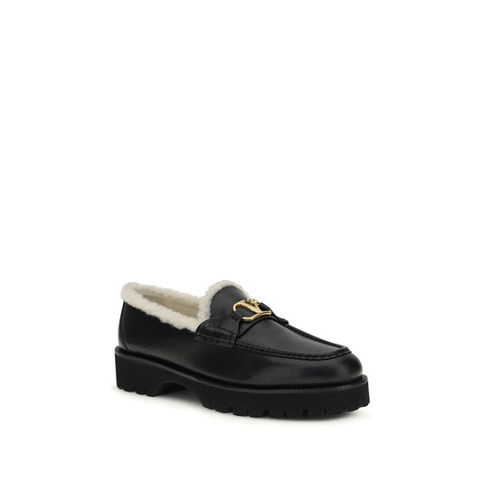 Valentino Garavani Black Calf Leather Bos Taurus Slip-On Loafers Curated Luxury Accessories by Orvyn