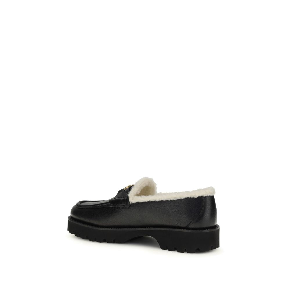 Valentino Garavani Black Calf Leather Bos Taurus Slip-On Loafers Curated Luxury Accessories by Orvyn