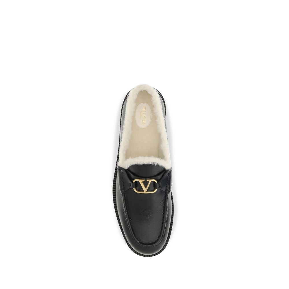 Valentino Garavani Black Calf Leather Bos Taurus Slip-On Loafers Curated Luxury Accessories by Orvyn