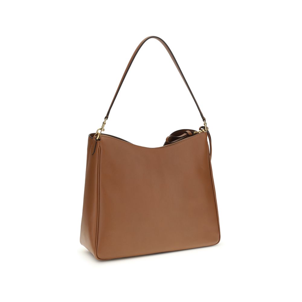 Balenciaga Beige Calf Leather Bos Taurus Shoulder Bag Curated Luxury Accessories by Orvyn