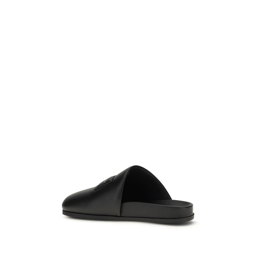 Givenchy Black Calf Leather Bos Taurus Mules Curated Luxury Accessories by Orvyn
