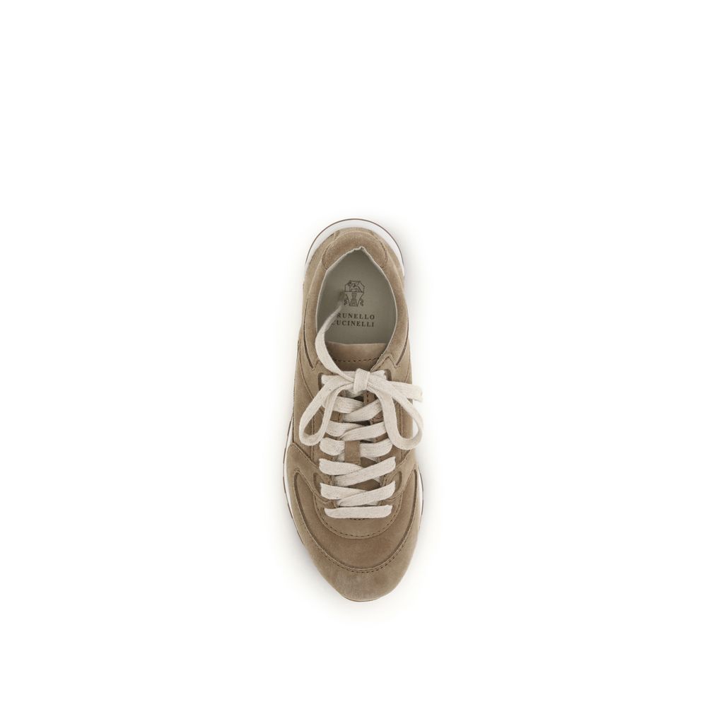 Brunello Cucinelli Beige Calf Leather Bos Taurus Low Top Sneakers Curated Luxury Accessories by Orvyn