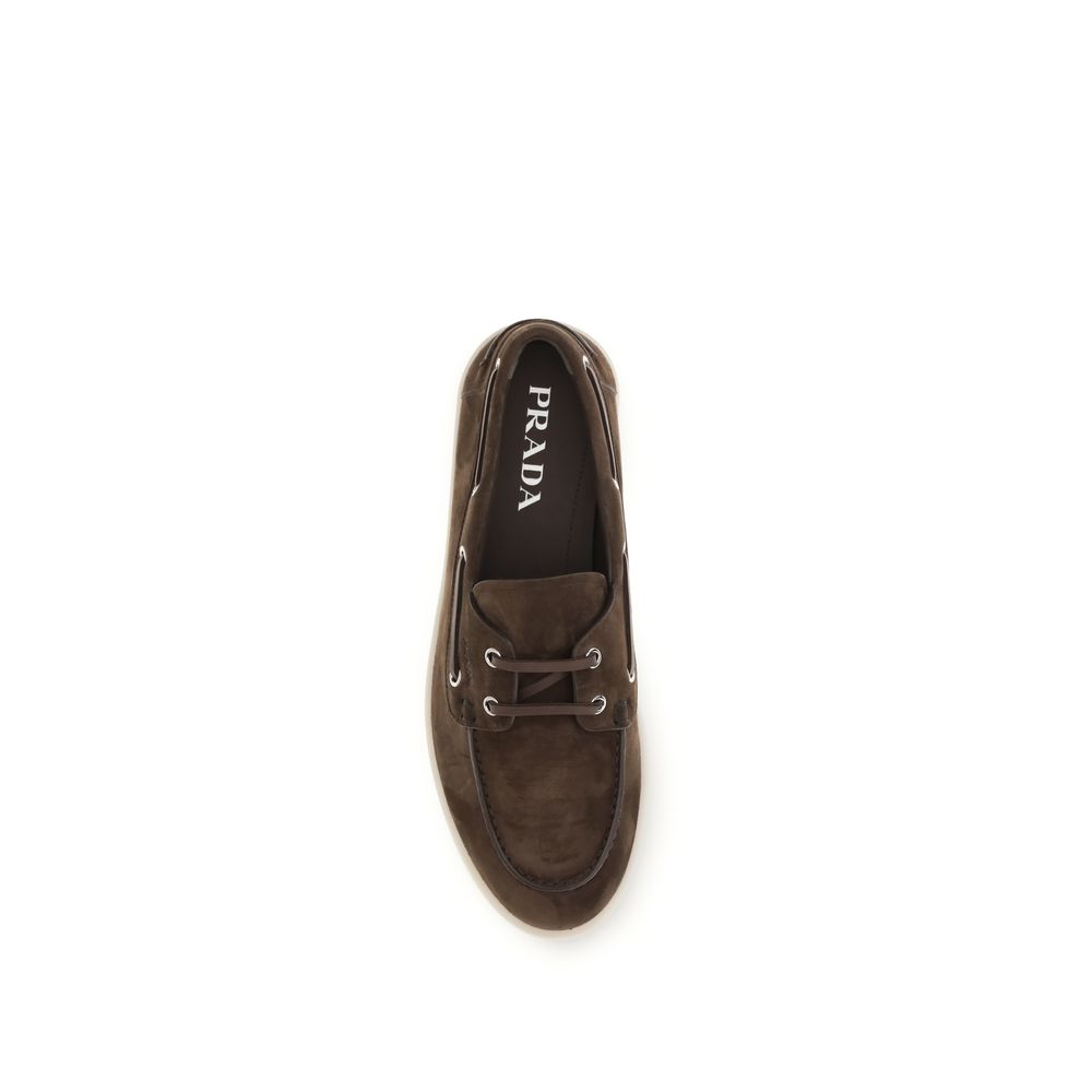 Prada Brown Calf Leather Bos Taurus Slip-On Loafers Curated Luxury Accessories by Orvyn