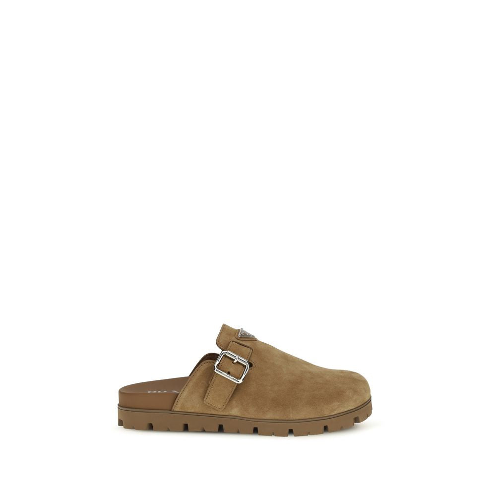 Prada Beige Calf Leather Bos Taurus Mules Curated Luxury Accessories by Orvyn
