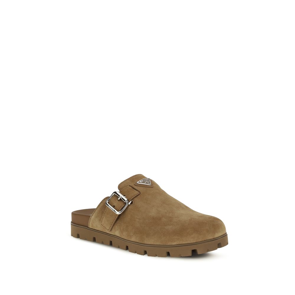 Prada Beige Calf Leather Bos Taurus Mules Curated Luxury Accessories by Orvyn