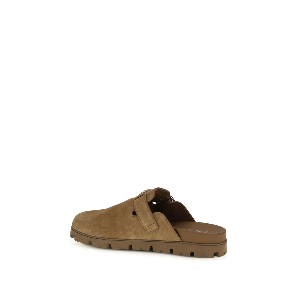 Prada Beige Calf Leather Bos Taurus Mules Curated Luxury Accessories by Orvyn