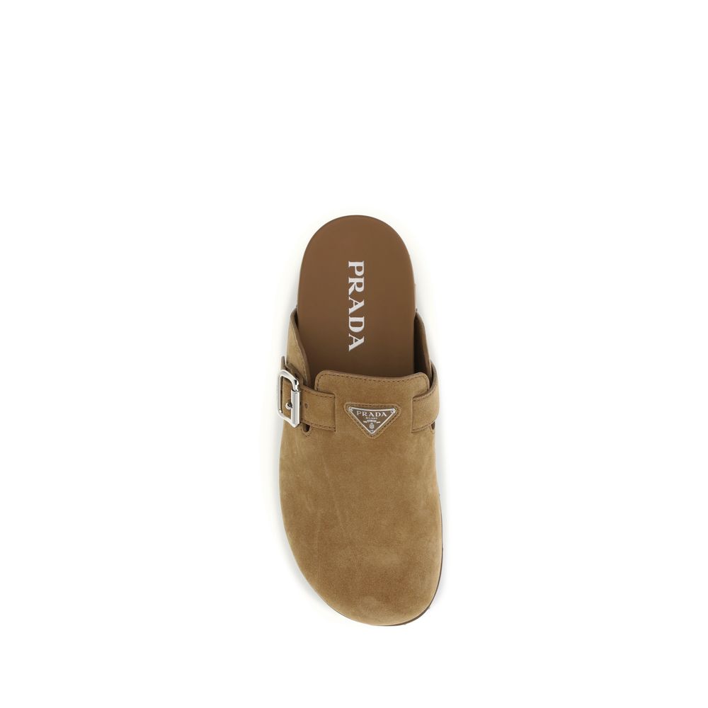 Prada Beige Calf Leather Bos Taurus Mules Curated Luxury Accessories by Orvyn