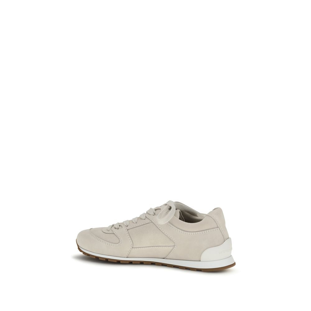 Brunello Cucinelli Beige Calf Leather Bos Taurus Low Top Sneakers Curated Luxury Accessories by Orvyn