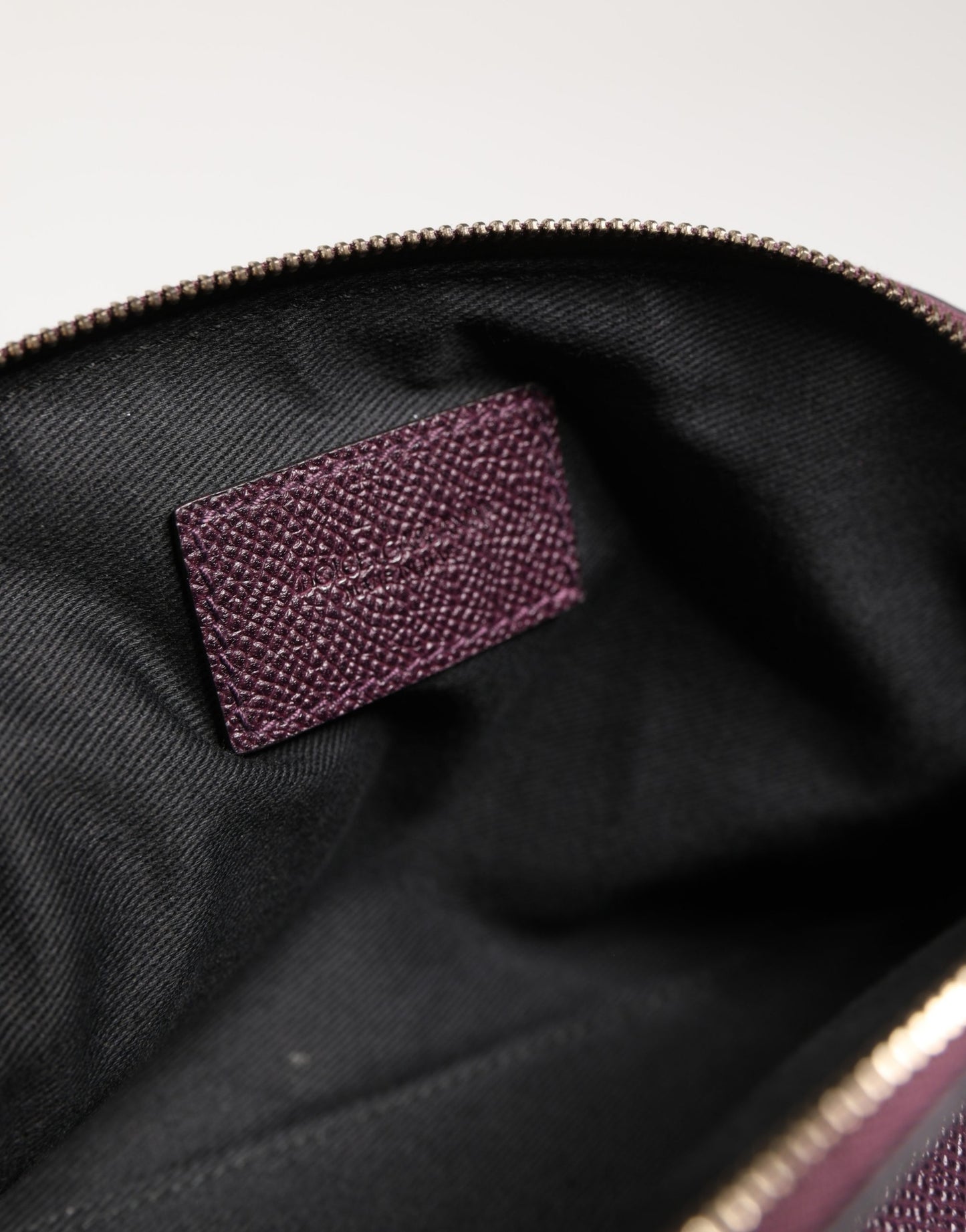 Dolce & Gabbana Dark Purple Leather DG Logo Zip Around Hand Purse Wallet Curated Luxury Accessories by Orvyn