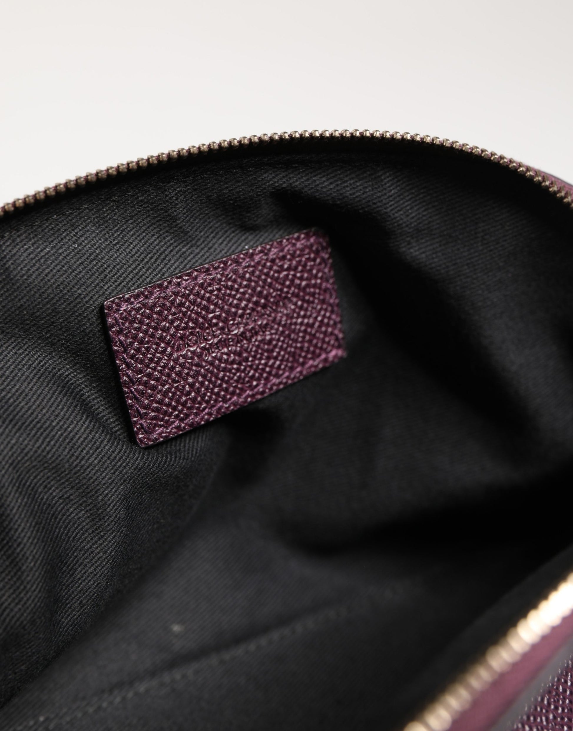 Dolce & Gabbana Dark Purple Leather DG Logo Zip Around Hand Purse Wallet Curated Luxury Accessories by Orvyn