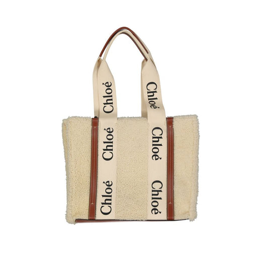 Chloé Beige Lamb Fur Tote Bag Curated Luxury Accessories by Orvyn
