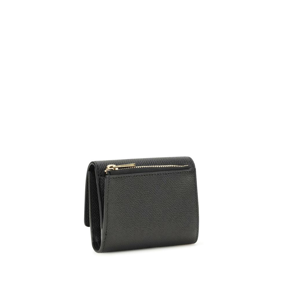 Ferragamo Black Calf Leather Bos Taurus Wallet Curated Luxury Accessories by Orvyn