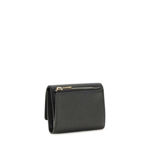 Ferragamo Black Calf Leather Bos Taurus Wallet Curated Luxury Accessories by Orvyn