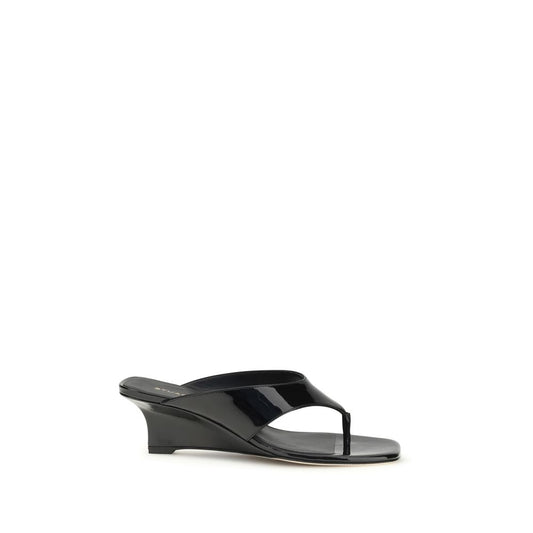 Stuart Weitzman Black Calf Leather Bos Taurus Wedge Sandals Curated Luxury Accessories by Orvyn