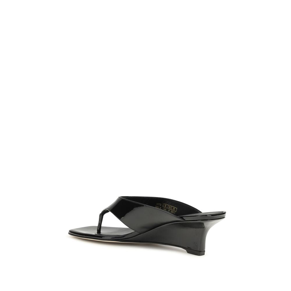 Stuart Weitzman Black Calf Leather Bos Taurus Wedge Sandals Curated Luxury Accessories by Orvyn