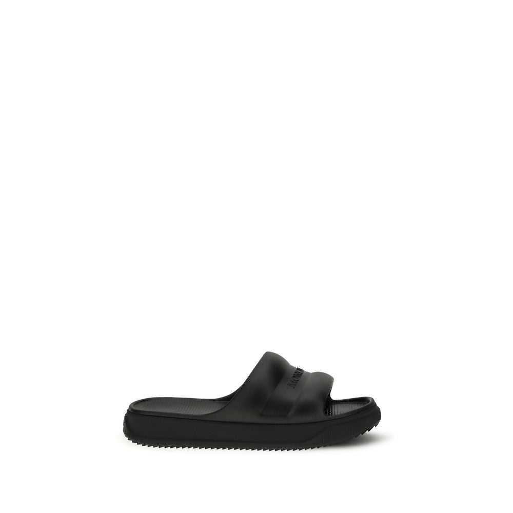 Moncler Black Rubber Flat Sandals Curated Luxury Accessories by Orvyn
