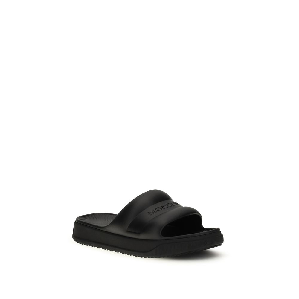 Moncler Black Rubber Flat Sandals Curated Luxury Accessories by Orvyn