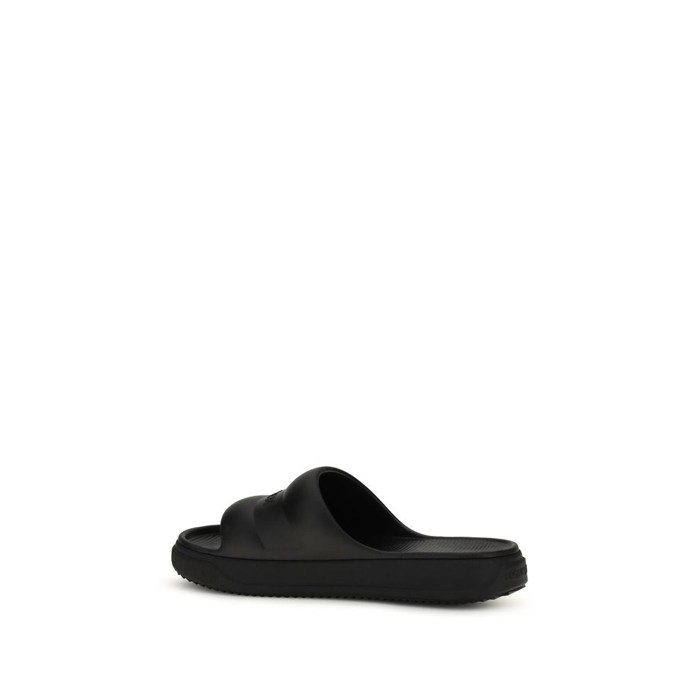 Moncler Black Rubber Flat Sandals Curated Luxury Accessories by Orvyn