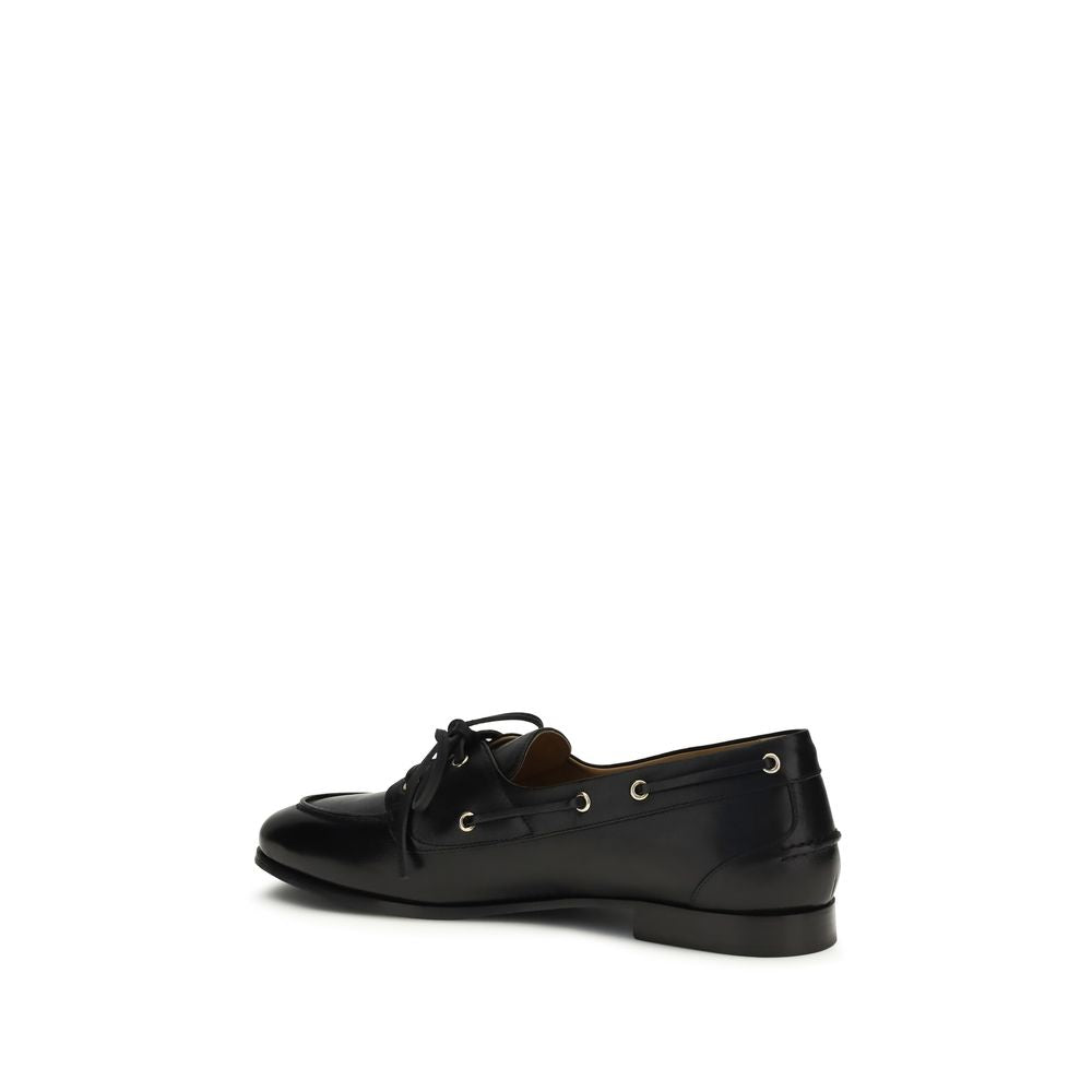 Bally Black Buffalo Leather Slip-On Loafers Curated Luxury Accessories by Orvyn