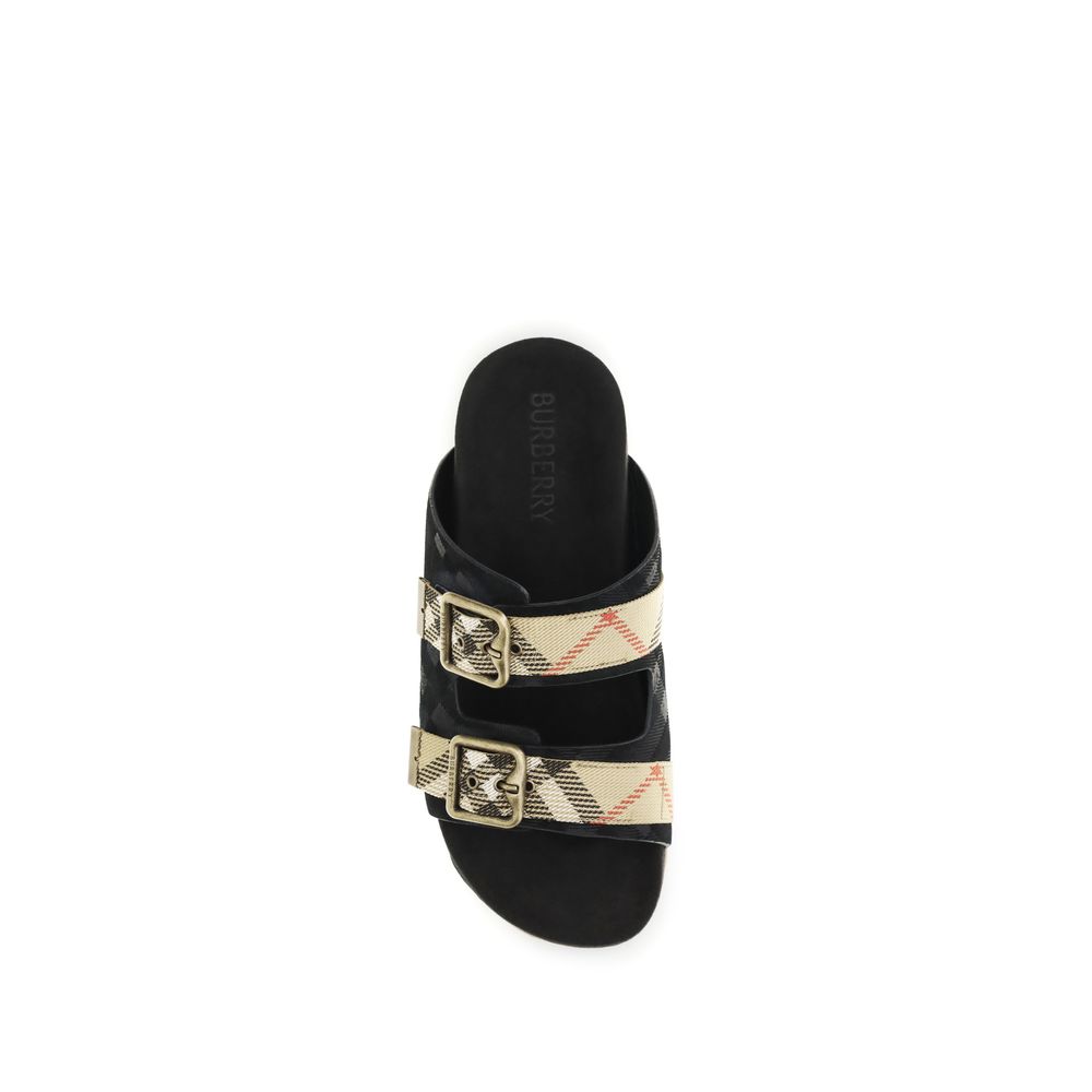 Burberry Black Calf Leather Bos Taurus Strap-On Sandals Curated Luxury Accessories by Orvyn