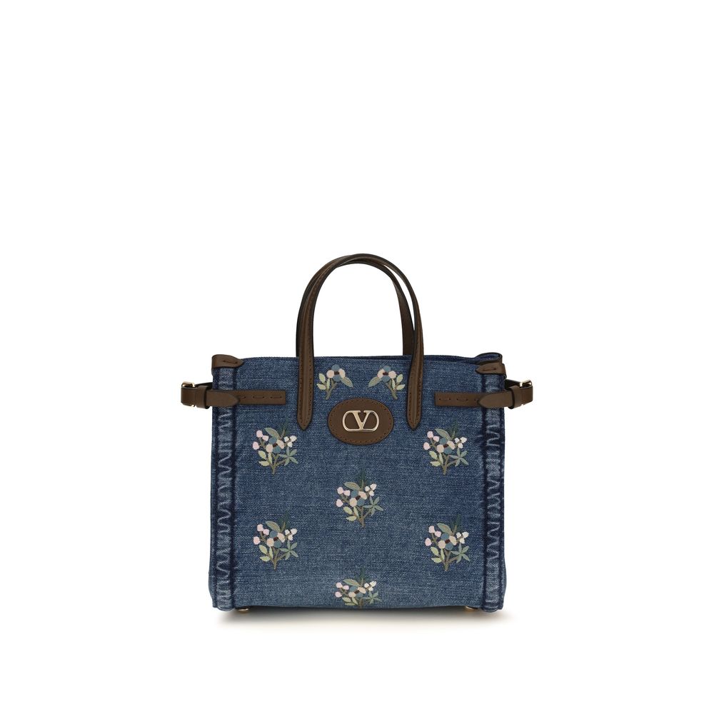 Valentino Garavani Blue Cotton Handbag Curated Luxury Accessories by Orvyn