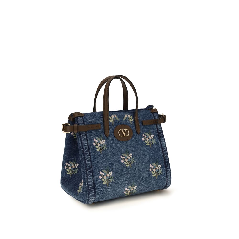 Valentino Garavani Blue Cotton Handbag Curated Luxury Accessories by Orvyn