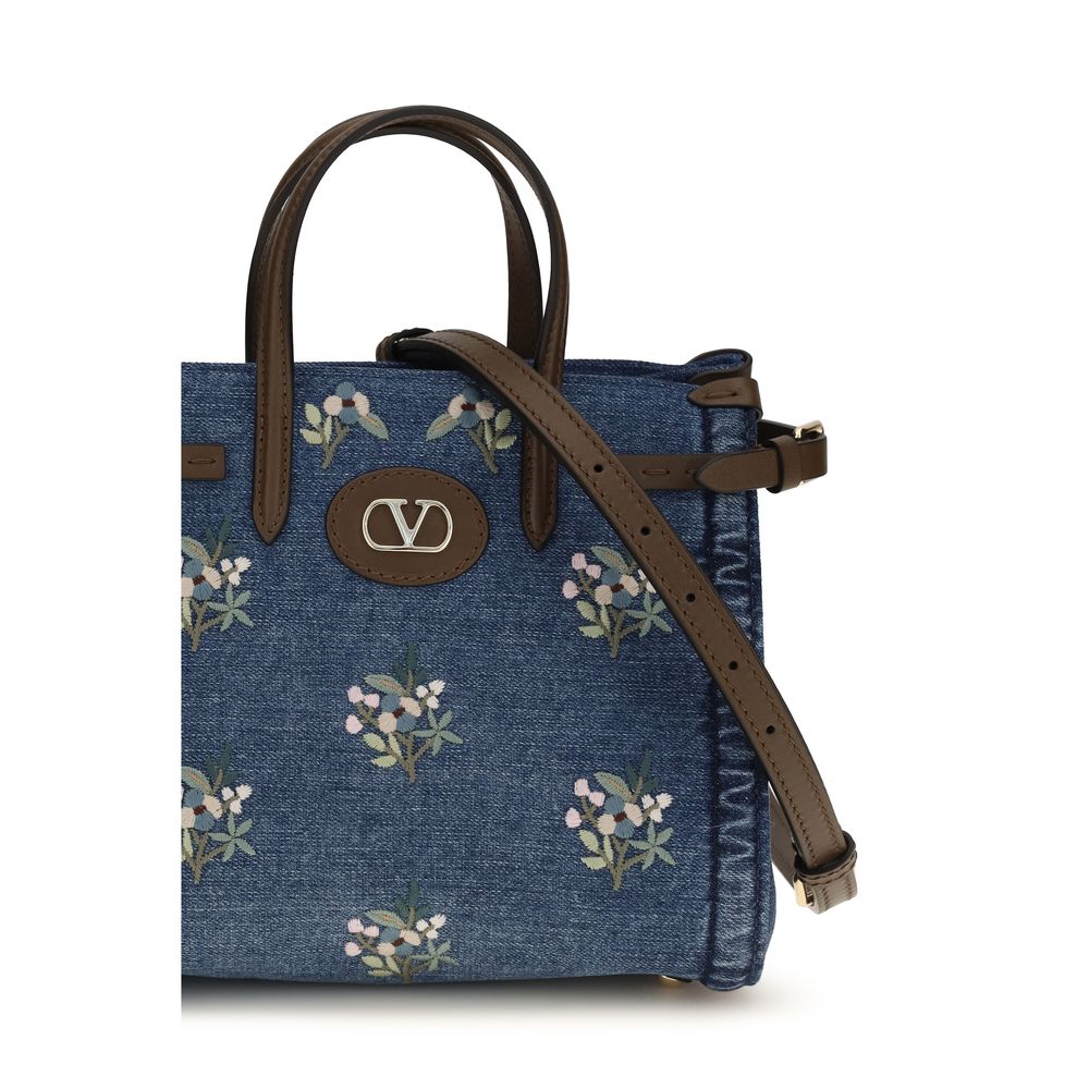 Valentino Garavani Blue Cotton Handbag Curated Luxury Accessories by Orvyn
