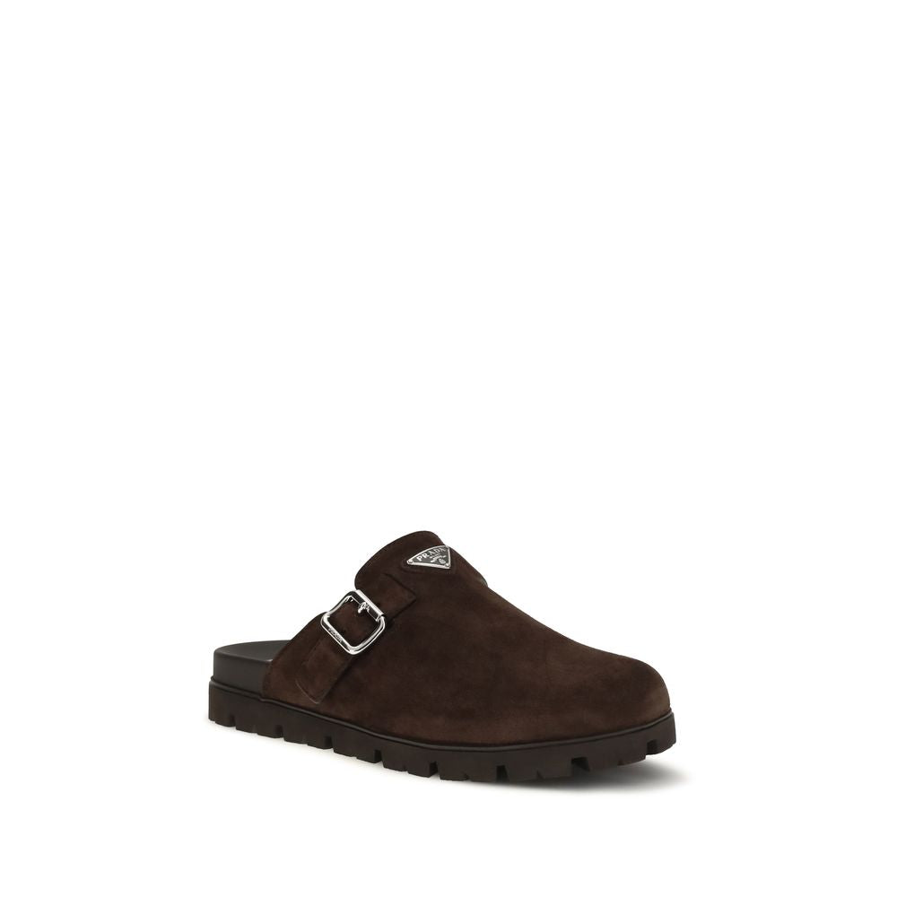 Prada Brown Calf Leather Bos Taurus Mules Curated Luxury Accessories by Orvyn