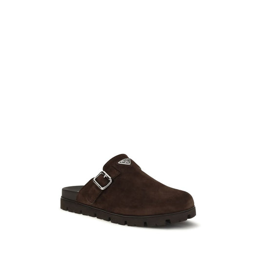 Prada Brown Calf Leather Bos Taurus Mules Curated Luxury Accessories by Orvyn
