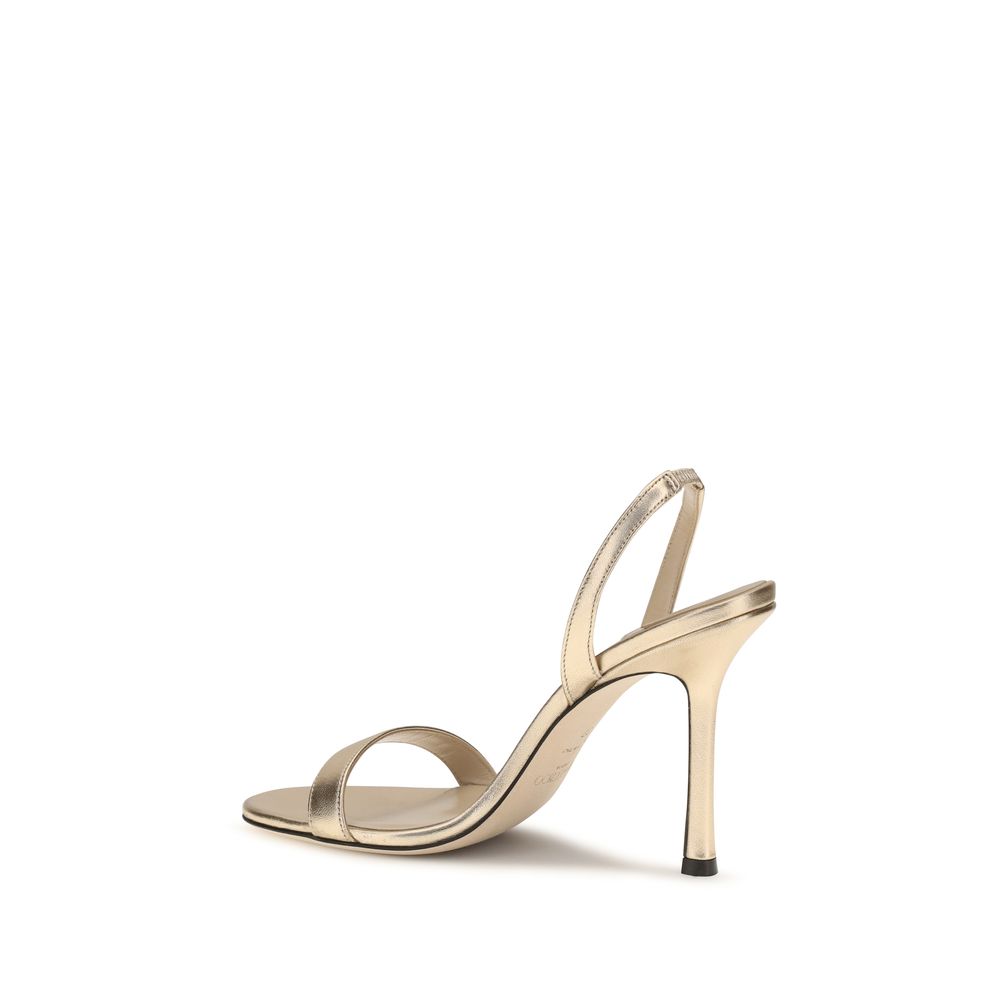 Jimmy Choo Gold Calf Leather Bos Taurus Stiletto Heel Sandals Curated Luxury Accessories by Orvyn