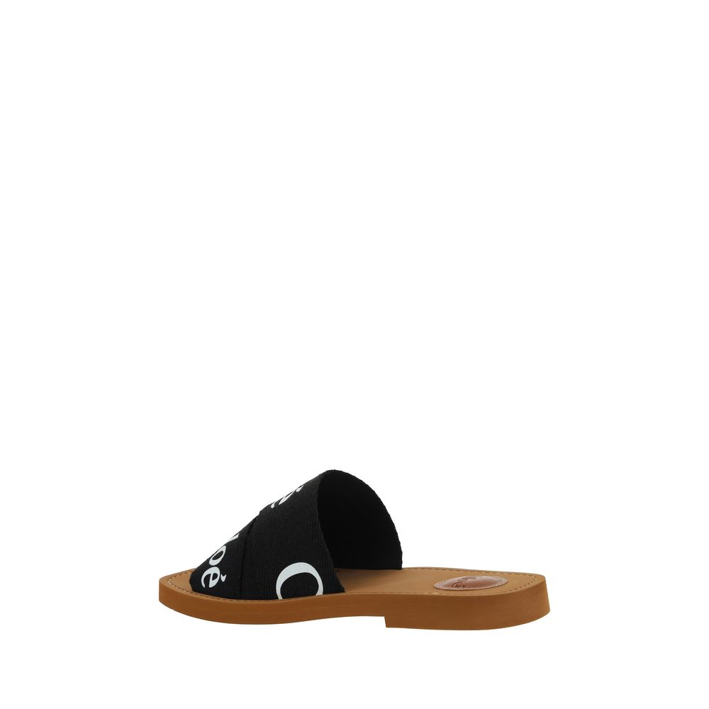 Chloé Black Linen Flat Sandals Curated Luxury Accessories by Orvyn