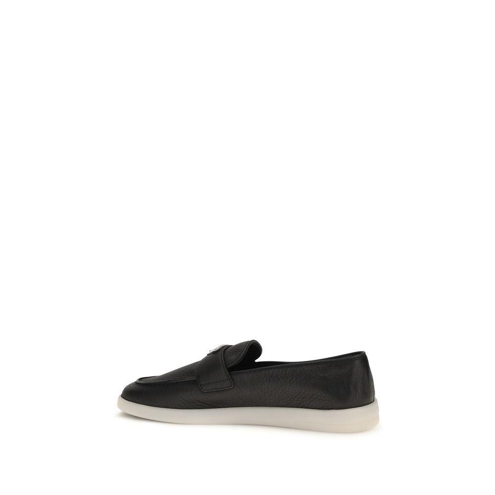 Prada Black Calf Leather Bos Taurus Slip-On Loafers Curated Luxury Accessories by Orvyn
