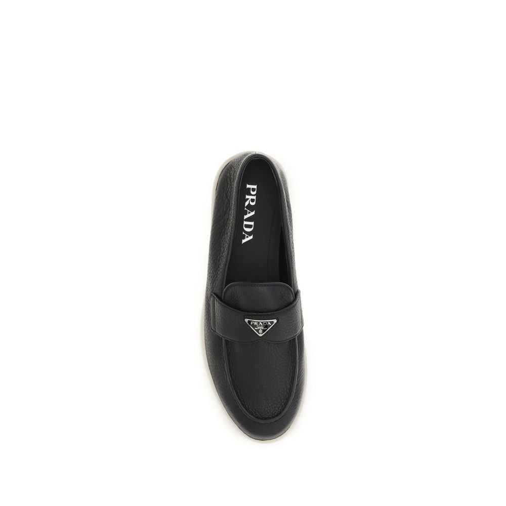 Prada Black Calf Leather Bos Taurus Slip-On Loafers Curated Luxury Accessories by Orvyn