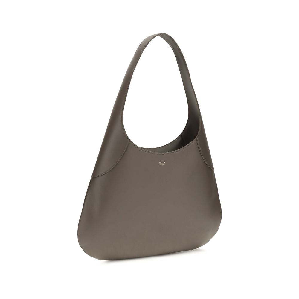 Khaite Gray Calf Leather Bos Taurus Handbag Curated Luxury Accessories by Orvyn