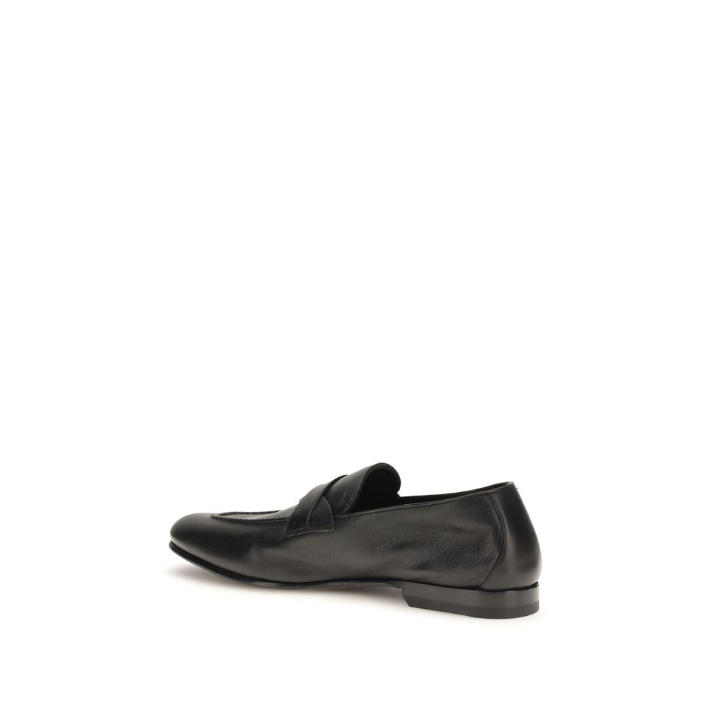 Tom Ford Black Calf Leather Bos Taurus Slip-On Loafers Curated Luxury Accessories by Orvyn