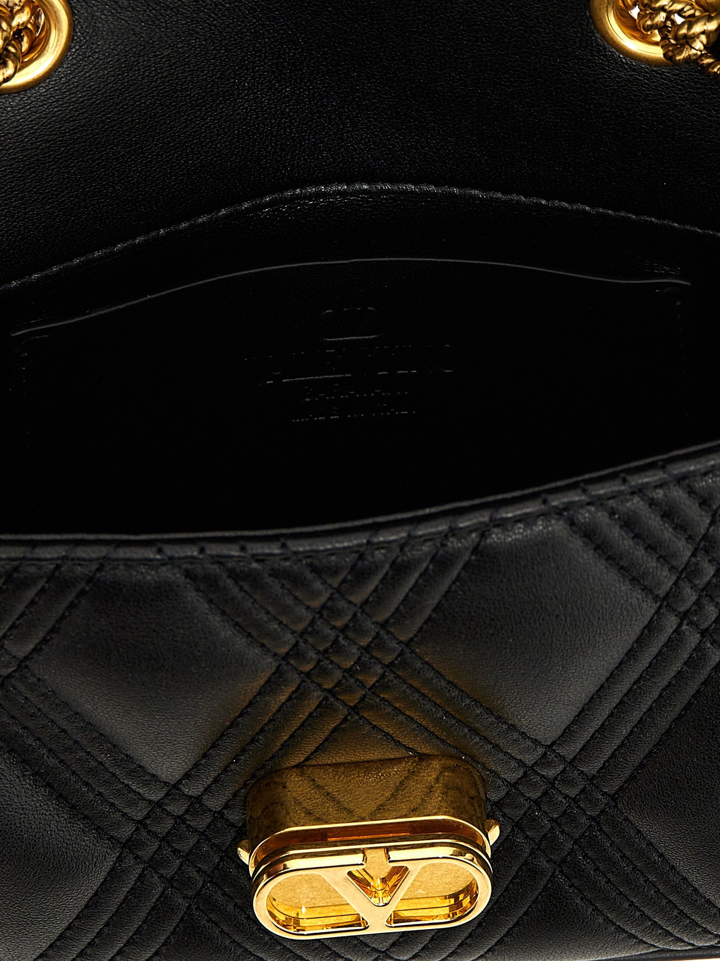 Valentino Garavani Black Lamb Leather Shoulder Bag Curated Luxury Accessories by Orvyn