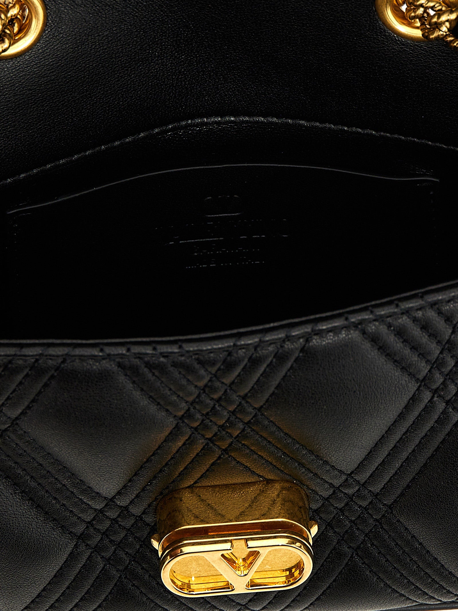 Valentino Garavani Black Lamb Leather Shoulder Bag Curated Luxury Accessories by Orvyn