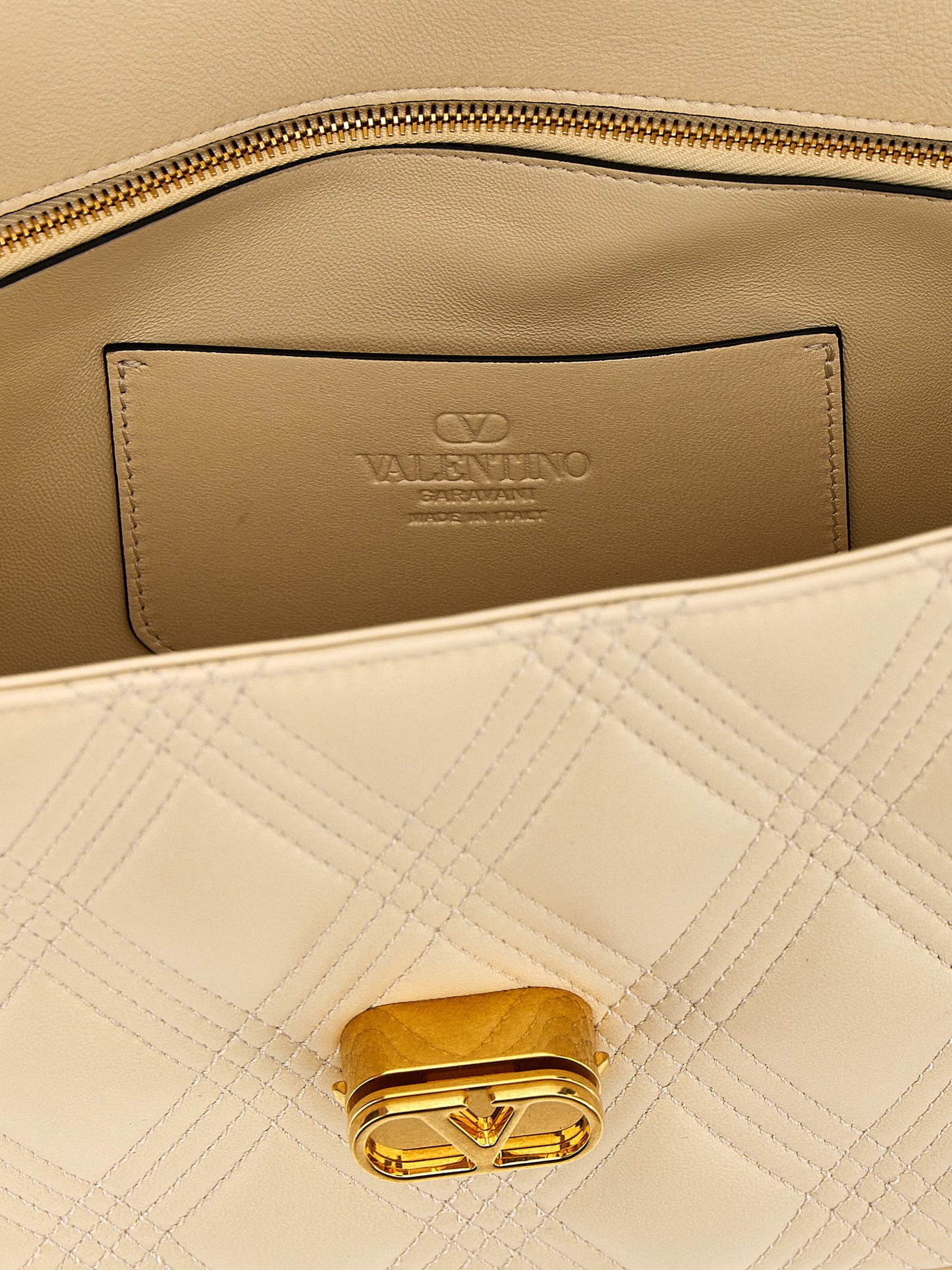 Valentino Garavani White Lamb Leather Shoulder Bag Curated Luxury Accessories by Orvyn