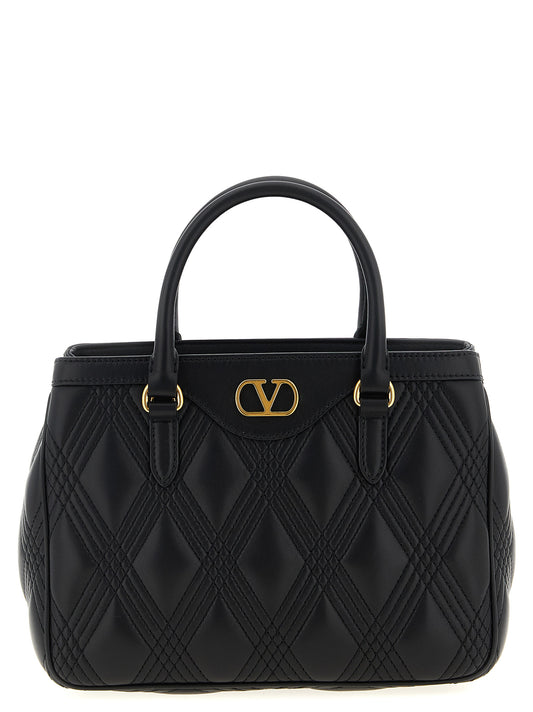 Valentino Garavani Black Lamb Leather Handbag Curated Luxury Accessories by Orvyn