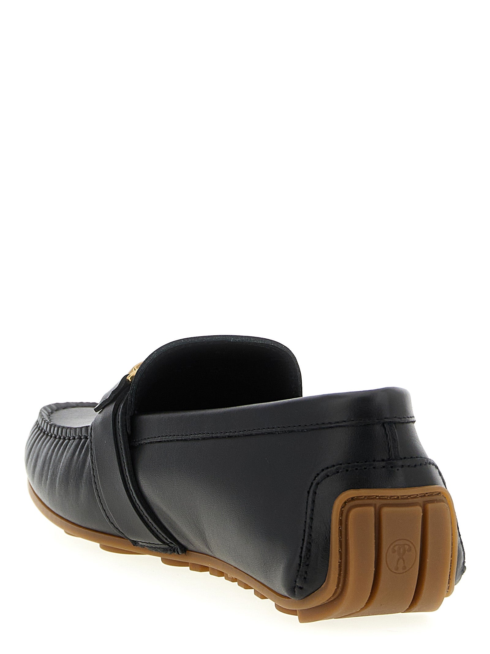 Moschino Black Leather Slip-On Loafers Curated Luxury Accessories by Orvyn