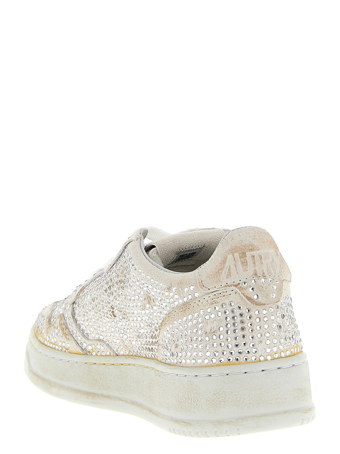 Autry Beige Cowhide Chunky Sneakers Curated Luxury Accessories by Orvyn