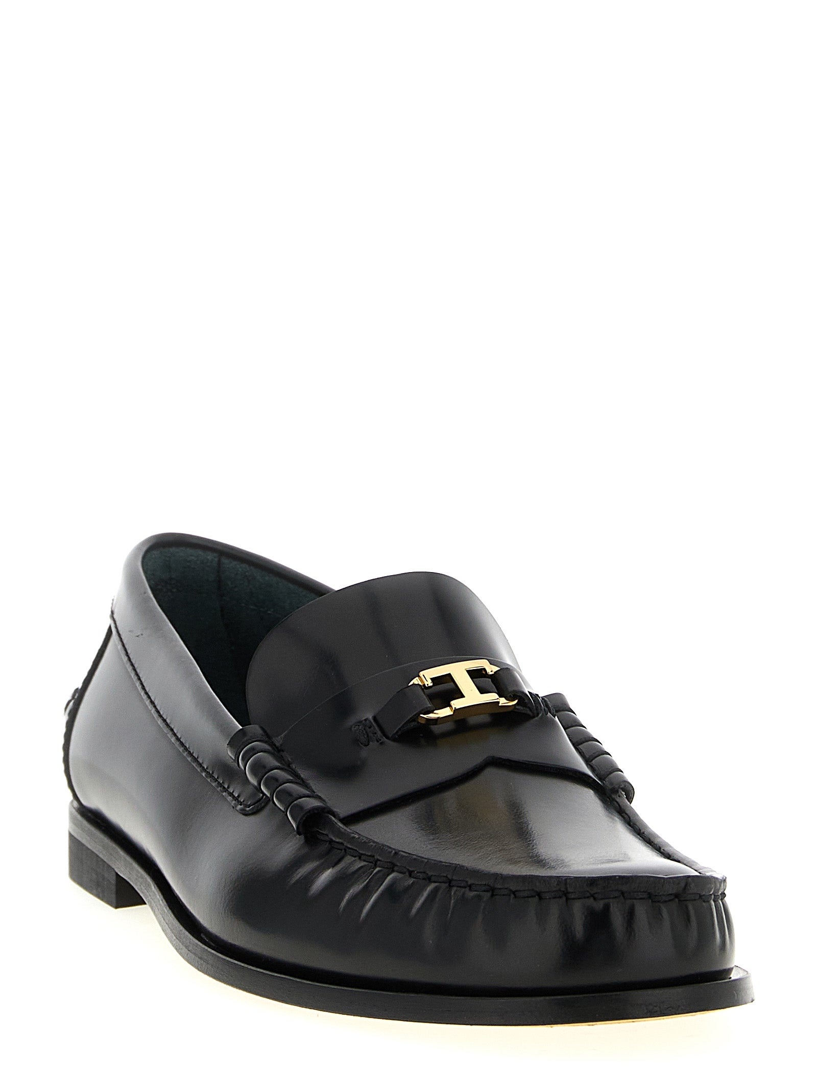 Tod's Black Calfskin Slip-On Loafers Curated Luxury Accessories by Orvyn