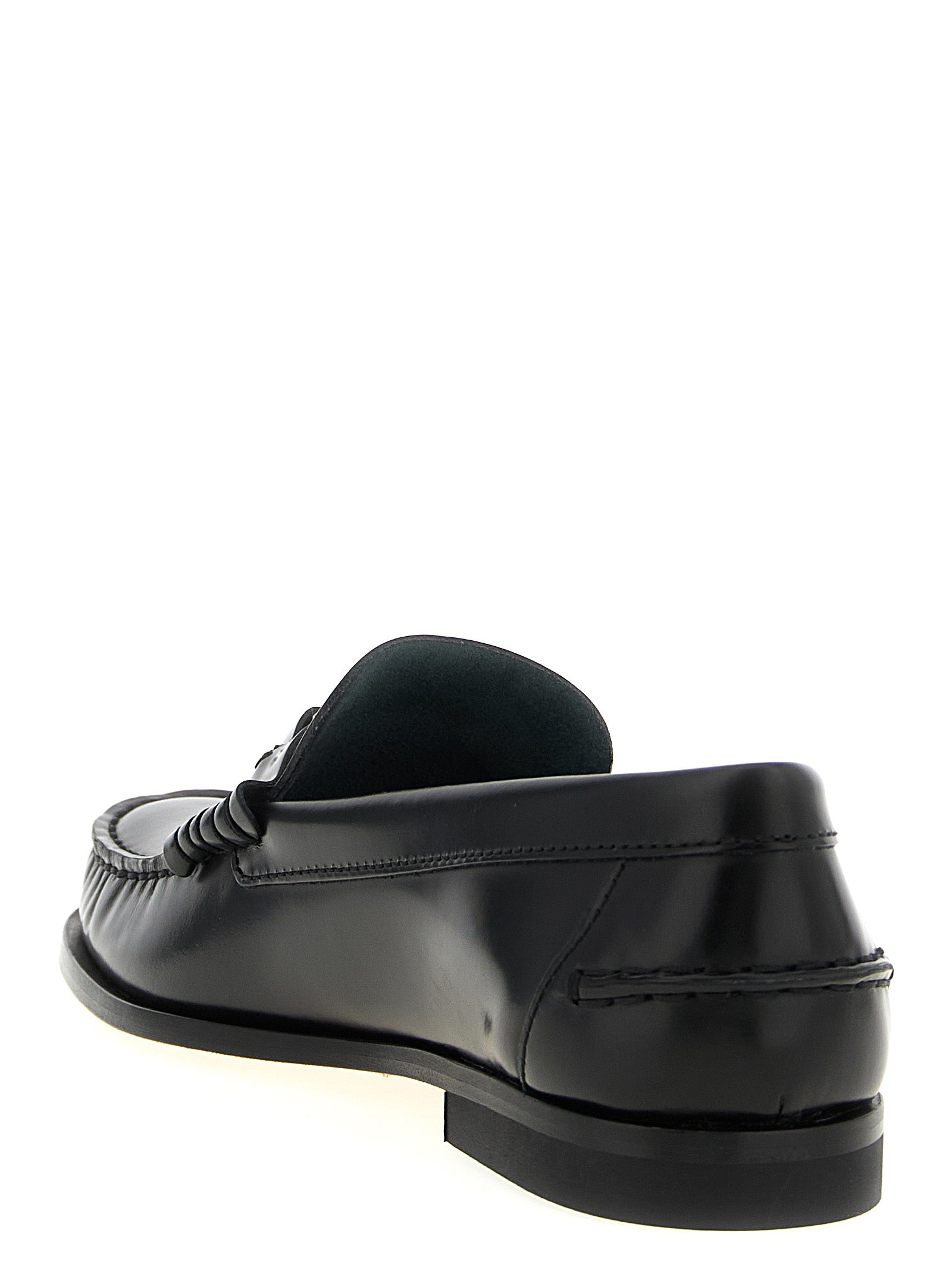 Tod's Black Calfskin Slip-On Loafers Curated Luxury Accessories by Orvyn