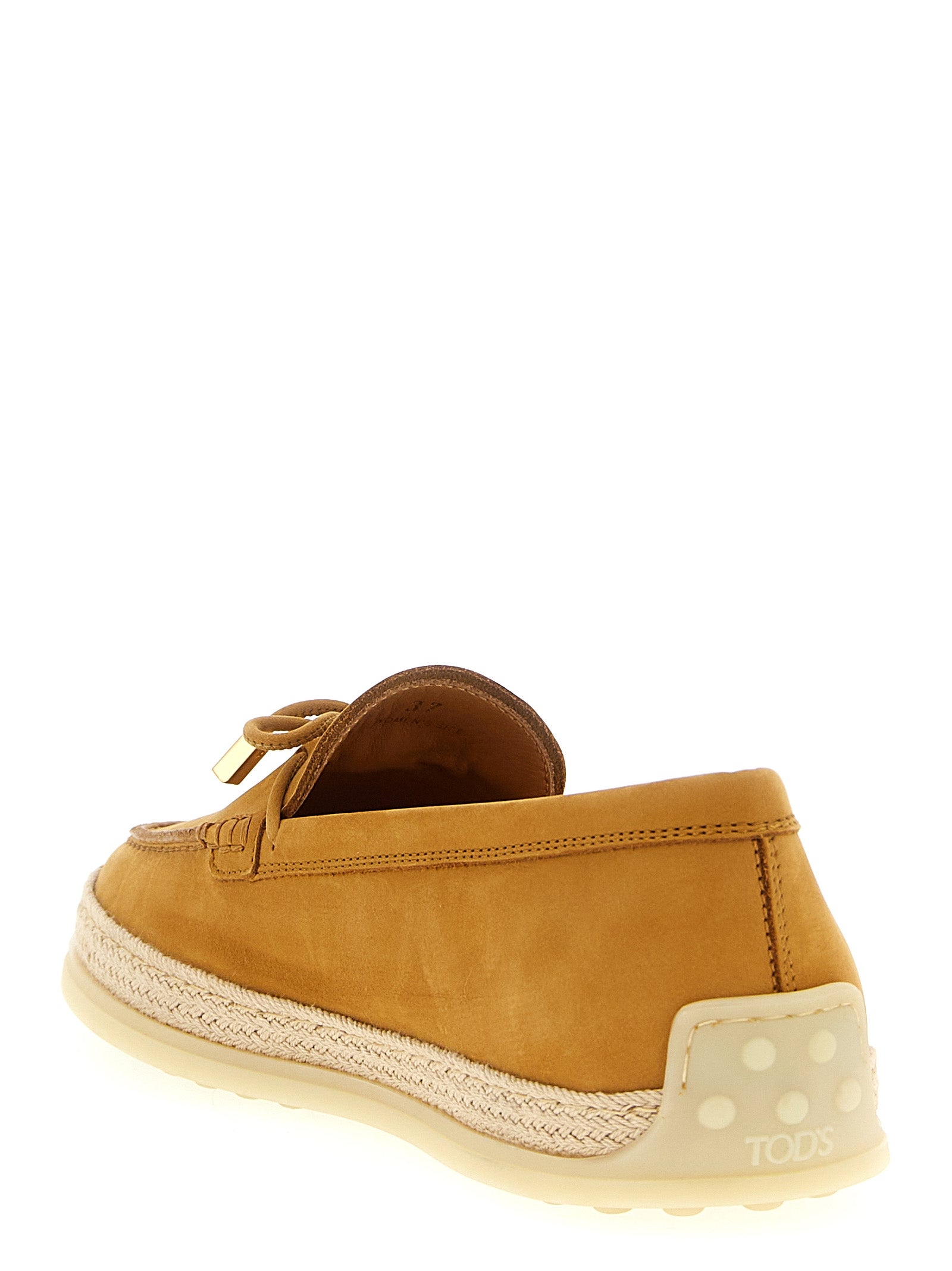 Tod's Beige Calfskin Slip-On Loafers Curated Luxury Accessories by Orvyn
