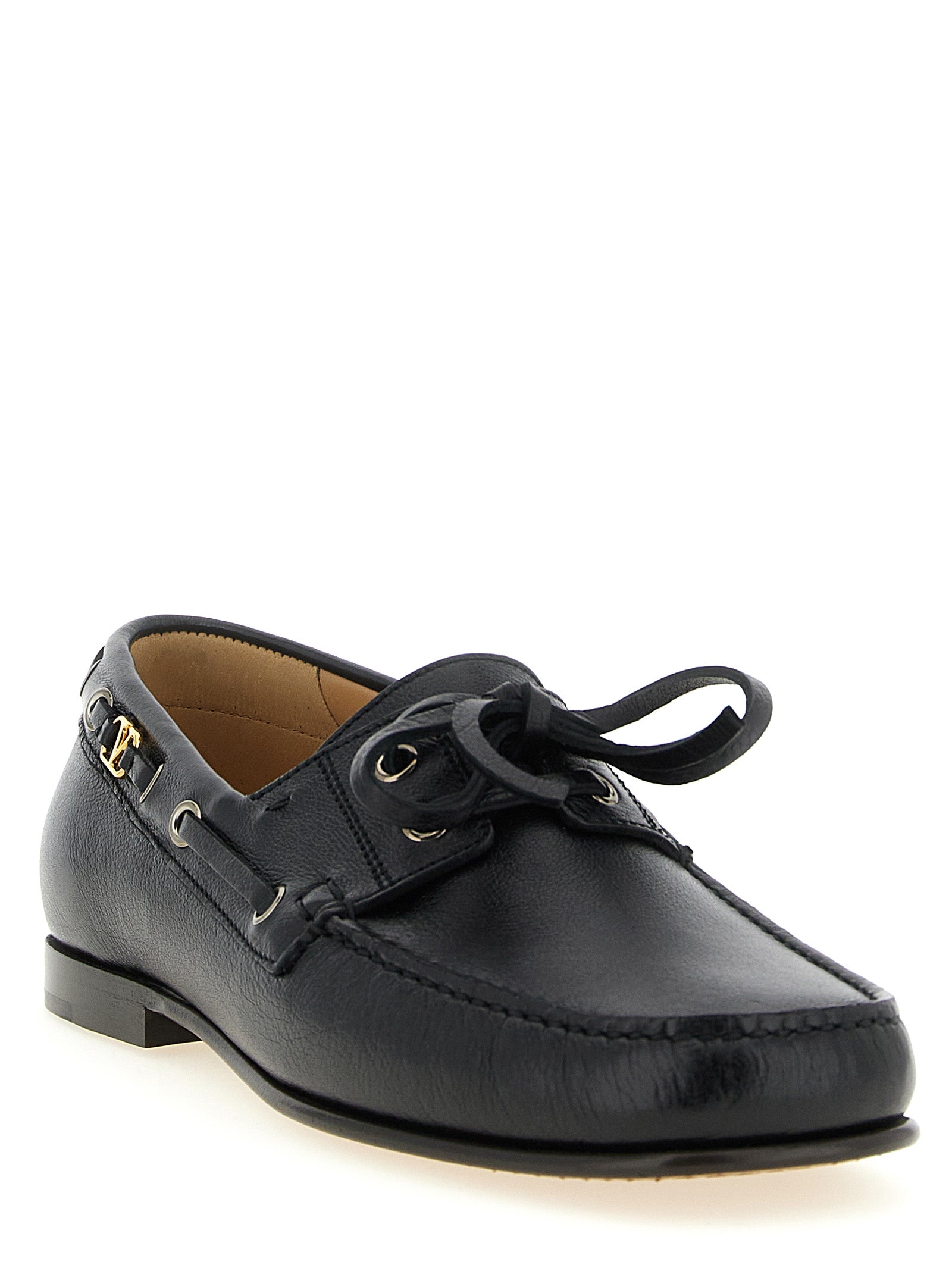 Valentino Garavani Black Buffalo Leather Slip-On Loafers Curated Luxury Accessories by Orvyn