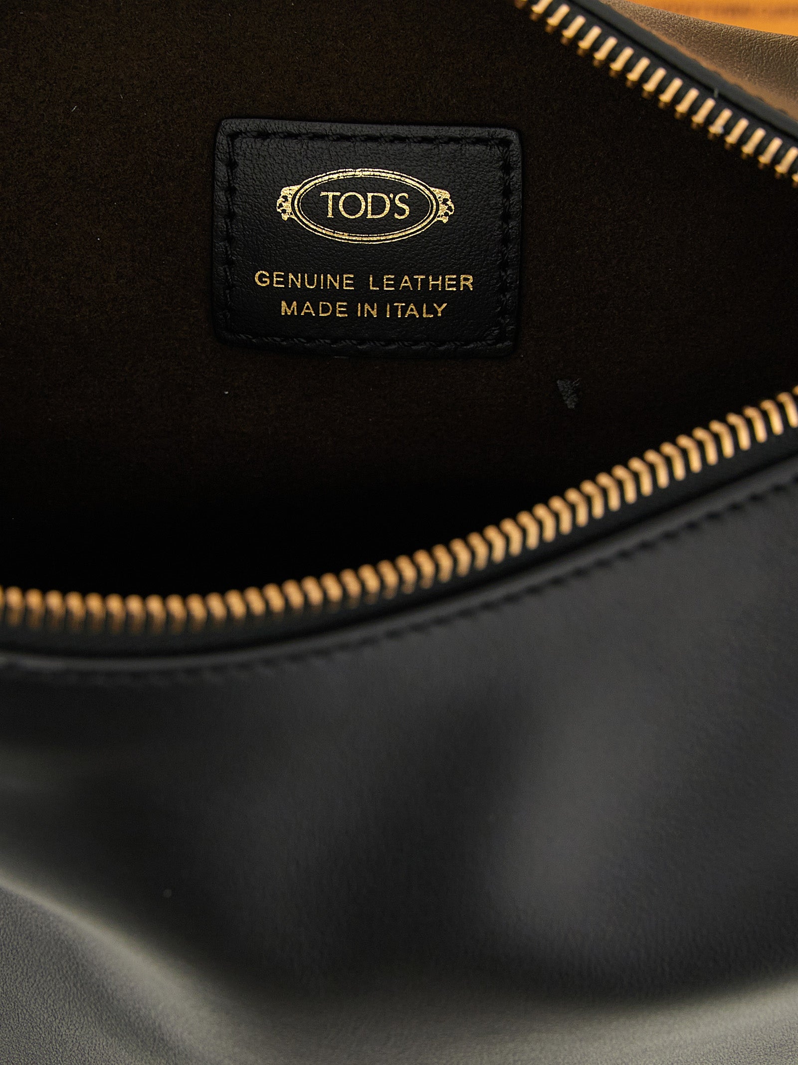 Tod's Black Calfskin Shoulder Bag Curated Luxury Accessories by Orvyn