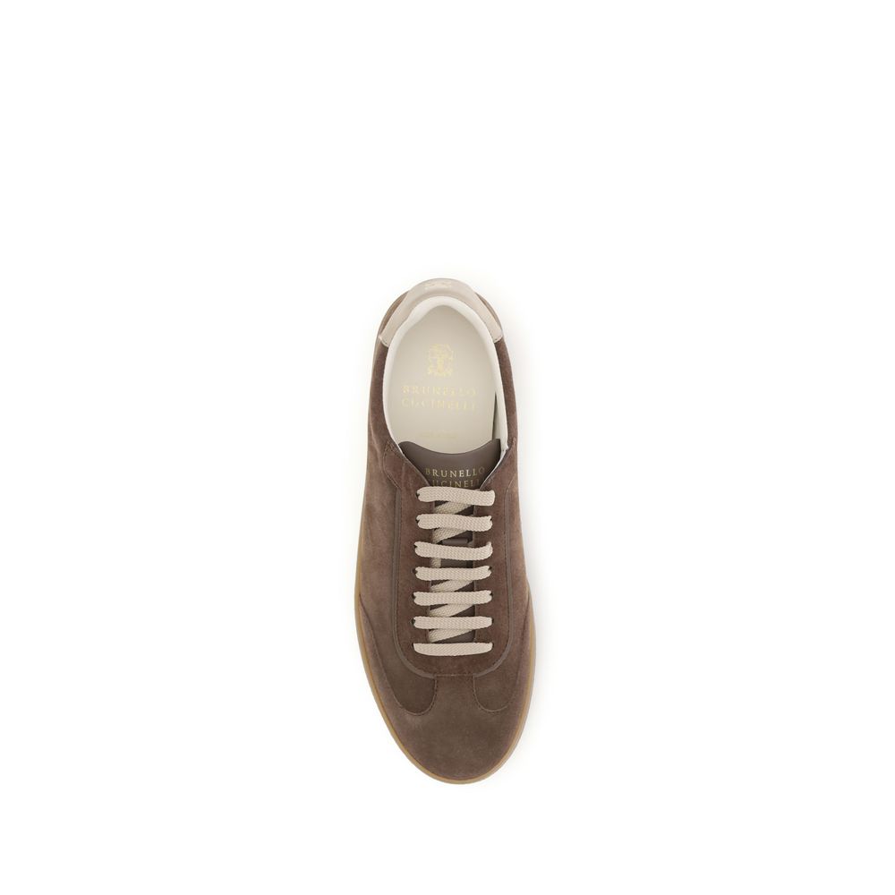 Brunello Cucinelli Beige Calf Leather Bos Taurus Low Top Sneakers Curated Luxury Accessories by Orvyn
