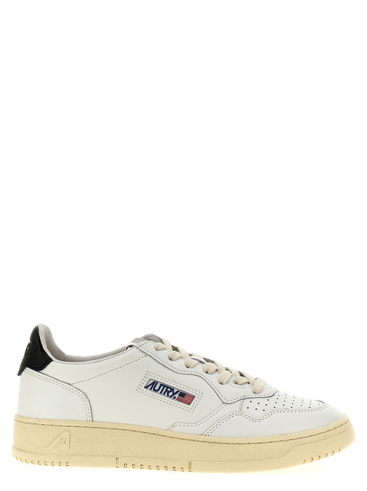 Autry Bicolor Calfskin Low Top Sneakers Curated Luxury Accessories by Orvyn
